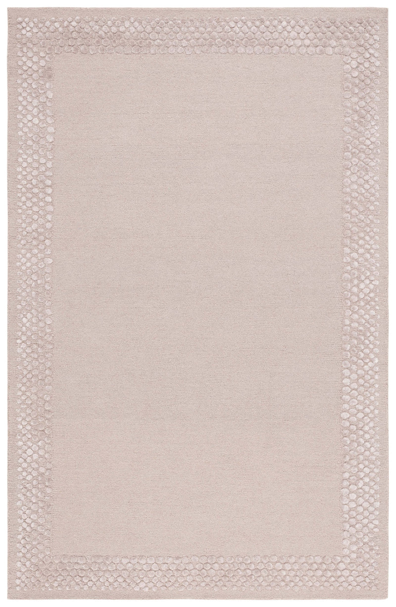 Blush beige textured area rug with pebble-style border, hand-tufted wool and viscose