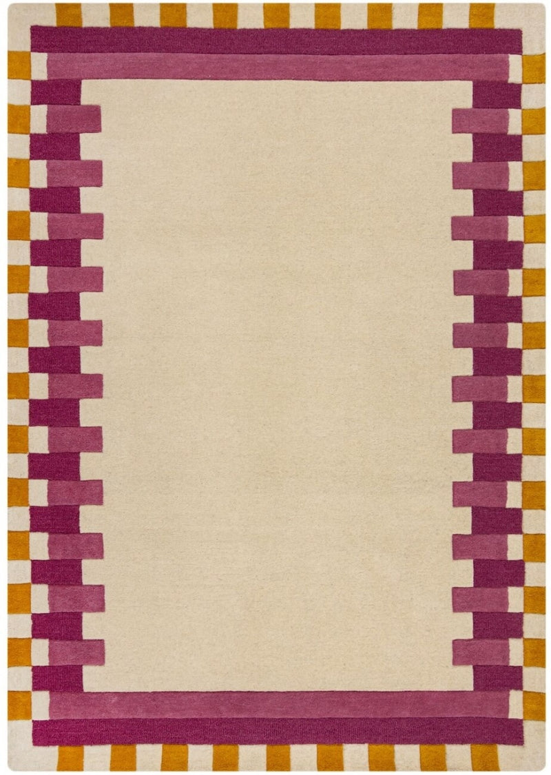 Tapis Kai rose et crème – Bordure en laine tuftée main