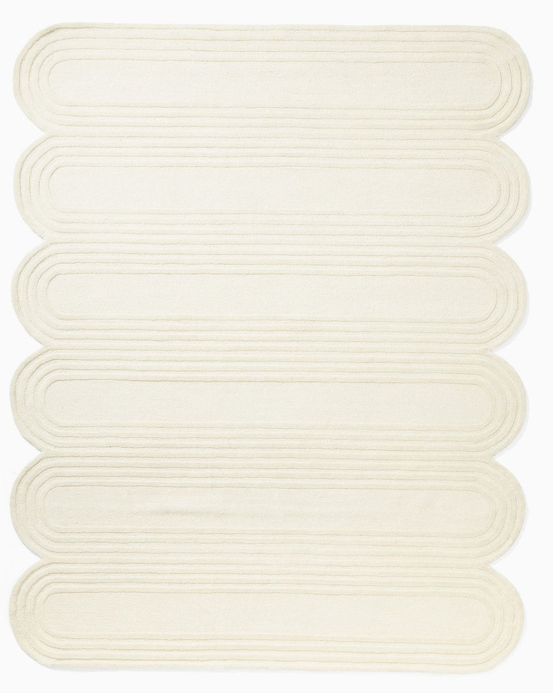 Tapis ovale festonné en laine tuftée à la main ivoire | Tapis moderne