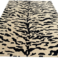 Aethel Abstract Tiger Stripe Hand Tufted Rug in Black & Sand