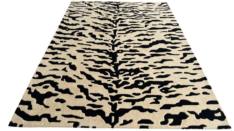 Aethel Abstract Tiger Stripe Hand Tufted Rug in Black & Sand