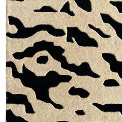Aethel Abstract Tiger Stripe Hand Tufted Rug in Black & Sand