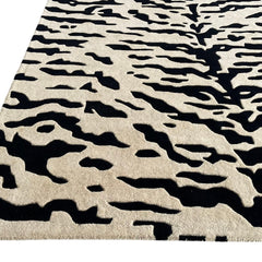 Aethel Abstract Tiger Stripe Hand Tufted Rug in Black & Sand