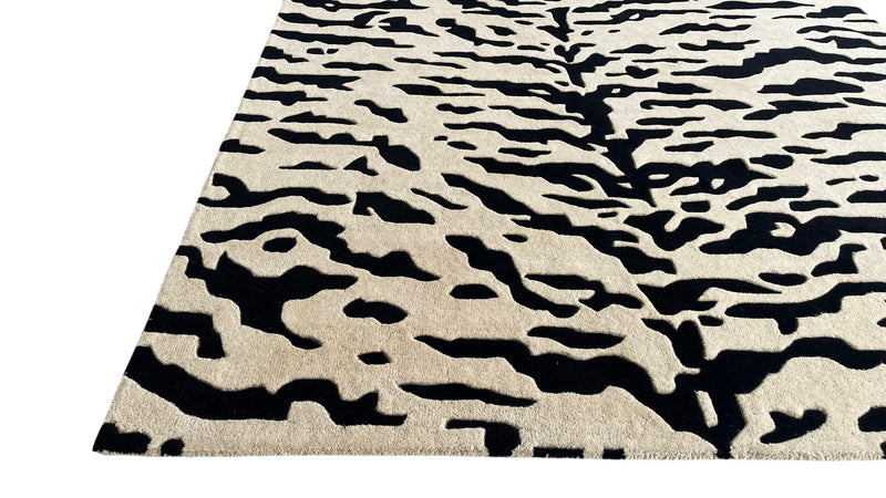 Aethel Abstract Tiger Stripe Hand Tufted Rug in Black & Sand