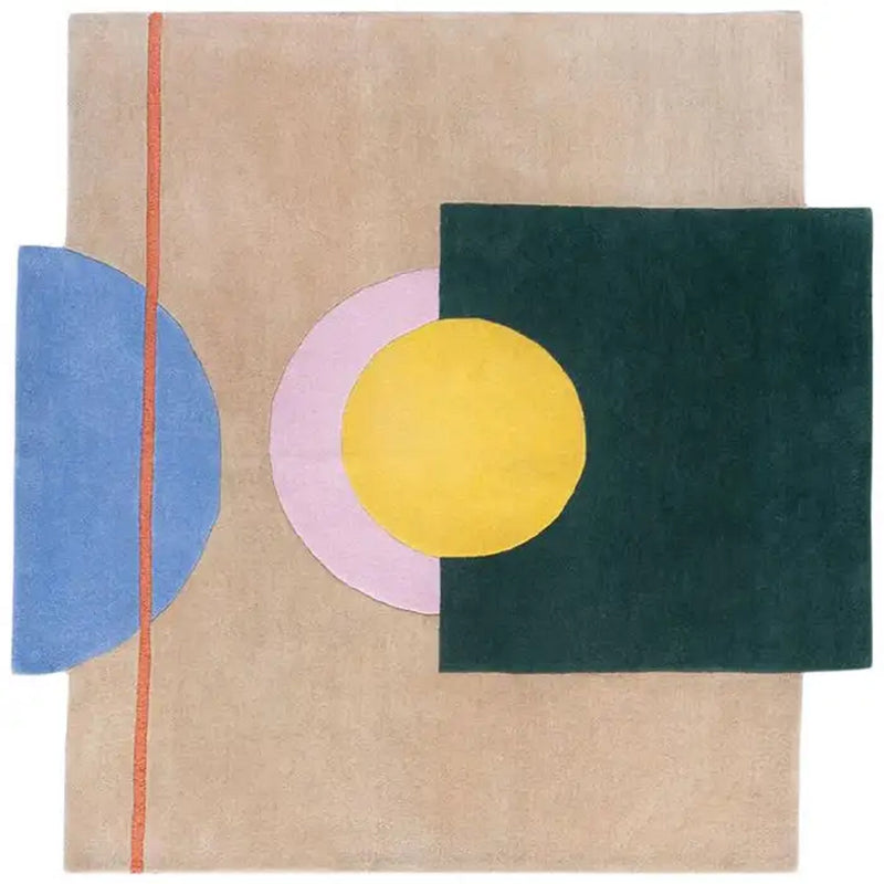 Beige abstract geometric wool rug with teal square, yellow circle, lilac ring, blue shape.